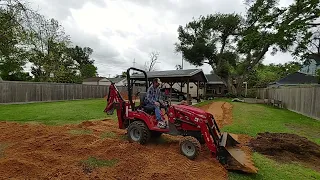 Using Massey GC Front End Loader To Fill Low Spots & Create Drainage In A Yard