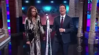 Steven Tyler gives Steven Colbert a few mic technique pointers. Very funny!