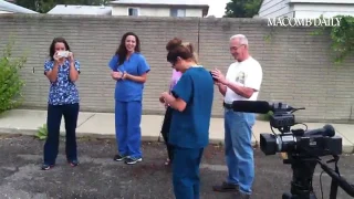 World-record speed brick breaker Kevin Taylor of Clinton Township breaks 30 bricks in 1.7 seconds. @