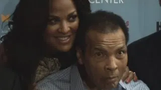 Muhammad Ali makes rare public appearance with his family