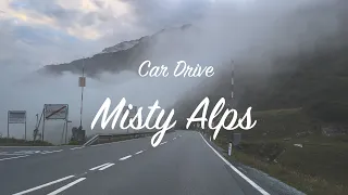 Misty Car Drive in Austrian Alps