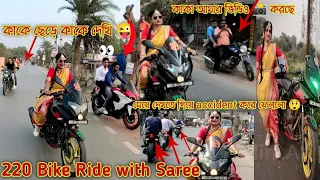 Pulsar 220 Bike Ride with Saree | On Saraswati Puja Public reaction 👀| Full Of Crowd😲#ladybiker