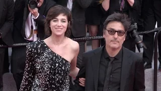 Laetitia Casta, Charlotte Gainsbourg et Ivan Attal  on the red carpet in Cannes