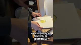 Customer opens clear vinyl record https://vinylrecordspressing.com