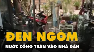 Nước cống, bùn đen chảy ra biển Mỹ Khê và tràn vào nhiều nhà dân ở Đà Nẵng