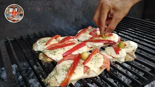 Pechugas de pollo a la pizza en la parrilla