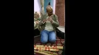 Baqir Abbas playing Subhash Thakur's flute