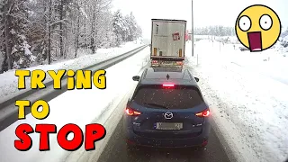 Truck slides into car + More Videos