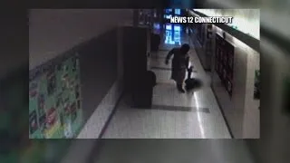Video: Principal drags kids down school hallway