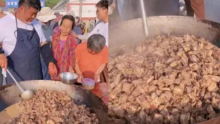 A Chinese man cooks 200 pounds of lamb for elderly people in rural areas