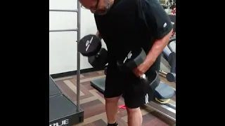 Rocky doing warm-ups/doing 225lbs for 26 reps