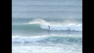 Barnaby Cox and Jim Finley surfing Sandymouth