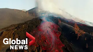 La Palma volcano: Drone video shows new land formed by lava that reached sea