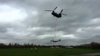 Britain's first jet fighter hitches a lift from helicopter on its way to new museum