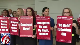 United flight attendants picket at Orlando International Airport