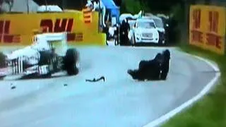 f1 marshal falls over