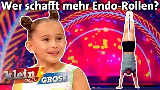 Fabian Hambüchen vs. Ajana (9): Wer macht mehr Endo-Rollen in einer Minute? | Klein gegen Groß