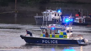 Police, Fire and Port of London Authority boats attend an incident