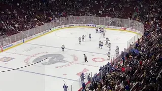 Fan throws canucks jersey on the ice