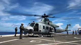 UH-1Y Helicopter Gunship Target Practice At Sea