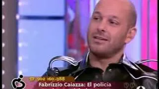 Fabrizio Caiazza in a black leather cop uniform