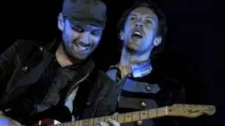 Chris Martin and Jonny Buckland from Coldplay