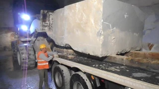 Marble block loaded in truck in Carrara quarry