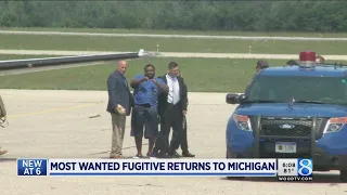 'Most Wanted' fugitive dances returns to MI, dances on tarmac