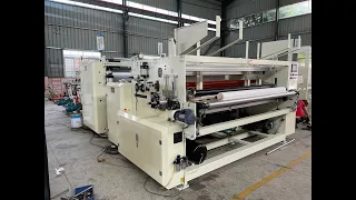 Toilet paper and kitchen towel rewinding machine with glue lamination and double embossing device