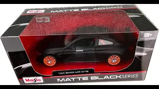 BMW M4 GTS in matt black, 1:24 scale diecast car model from Maisto, MAi31246