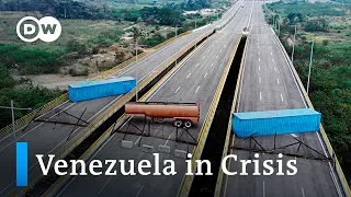 Venezuela blocks US aid transports | DW News