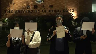 Hong Kongers hold vigil at university campus in solidarity with China protests | AFP