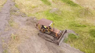 Cat D2 and other old dozers pushing dirt