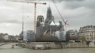 Reconstructed Notre Dame cathedral's spire revealed in Paris after devastating 2019 fire
