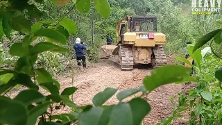 Caterpillar D6R XL Bulldozer Working to Level Agricultural Roads in Villages