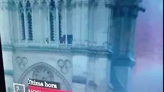 who is walking around the Notre Dame tower?