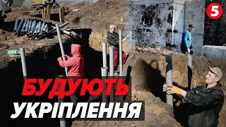 СОТНІ метрів ТРАНШЕЙ, бетонні споруди: на Харківщині будують укріплення другої лінії оборони