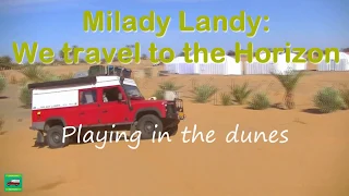 Dune driving in a classic Land Rover Defender 130, overland, off road, 4x4 camper