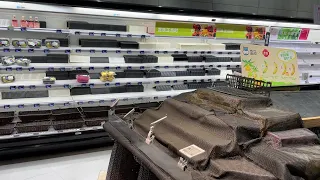 Empty supermarket shelves in Shanghai after day of Covid panic buying | AFP