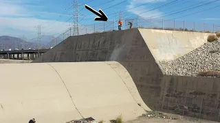 Jumping down a massive drain on a dirt bike