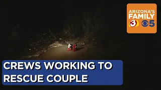 Crews rescuing 2 people trapped in Salt River in Phoenix