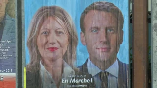 French voters decide if Macron's reform plans stay