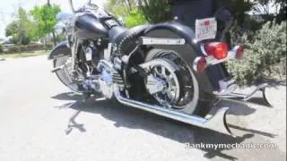 Very Loud Harley Davidson Heritage Softail with True Duals Lowered with lots of chrome.