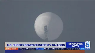 US downs Chinese balloon over ocean, moves to recover debris