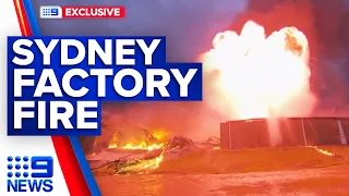Toxic smoke and fireballs: 100 firefighters battle Sydney factory fire | 9 News Australia