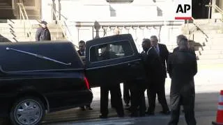 Casket carrying Philip Seymour Hoffman arrives at funeral with his family