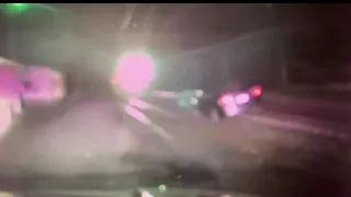 Amtrak train slams into car stuck on tracks in New Jersey. Police dashcam captures crash.