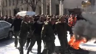 Protesters Burn Tires Outside Ukraine President's Office: Activists demand purging the government