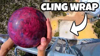 BOWLING BALL Vs. 60 LAYERS of CLING WRAP from 45m!