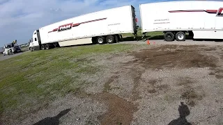 TOW TRUCK TUGS TWO TRACTOR-TRAILERS AT THE SAME TIME